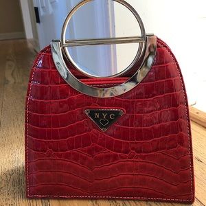 Red NYC boutique purse with silver hardware